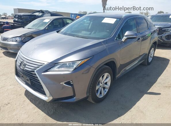 2T2BZMCA5HC133196 2017 LEXUS RX 350 Серый Передняя левая четверть