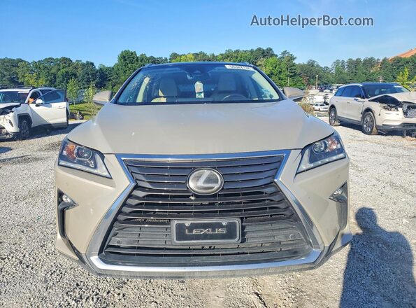 2T2BZMCA6GC031176 2016 LEXUS RX Tan Вид спереду