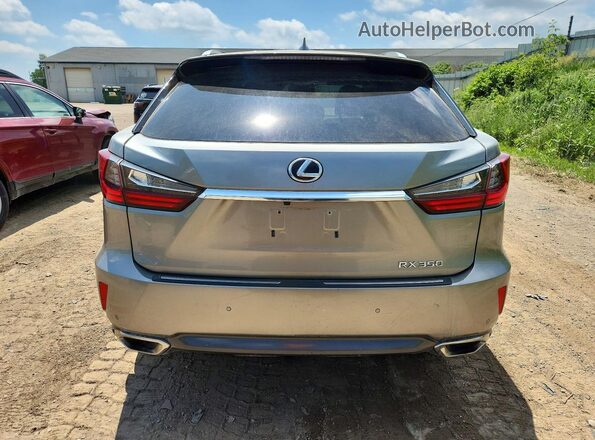 2T2BZMCA6HC110249 2017 LEXUS RX Silver Вид ззаду