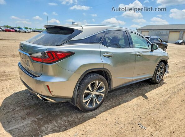 2T2BZMCA6HC110249 2017 LEXUS RX Silver Задня права чверть