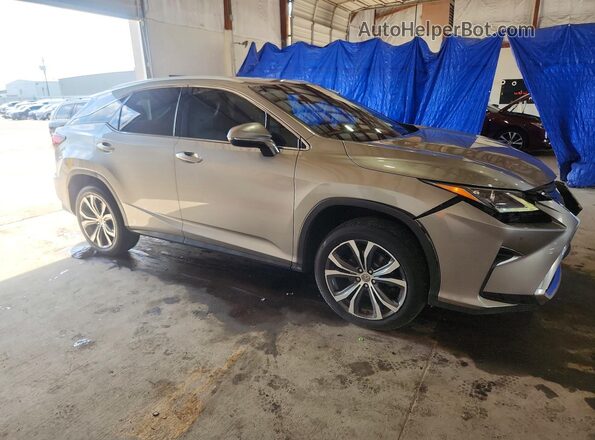 2T2BZMCA8HC111371 2017 LEXUS RX Серебряный Передняя правая четверть