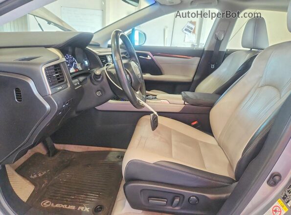 2T2BZMCA8HC111371 2017 LEXUS RX Серебряный Вид салона спереди