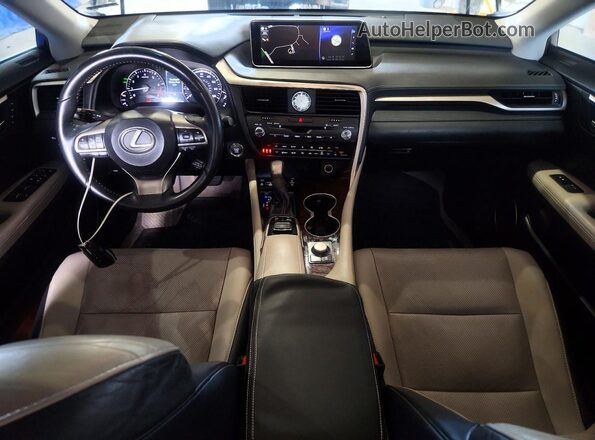 2T2BZMCA8HC111371 2017 LEXUS RX Серебряный Вид панели приборов