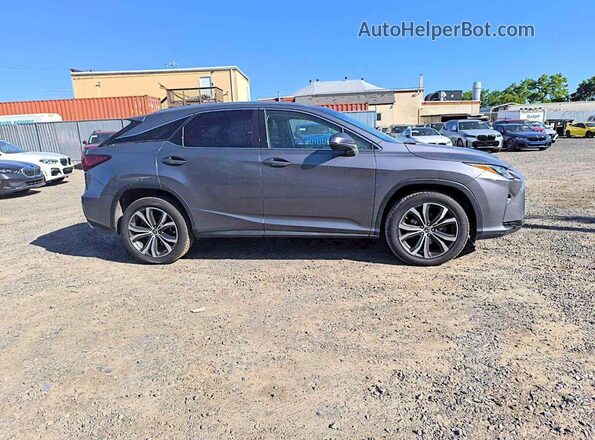 2T2BZMCA8JC160205 2018 LEXUS RX Silver Widok naklejki z numerem VIN