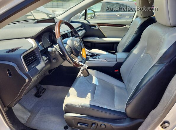 2T2BZMCAXGC021668 2016 LEXUS RX Silver Widok wnętrza z przodu