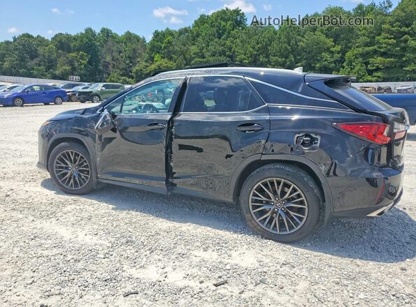 2T2BZMCAXKC174429 2019 LEXUS RX Black Trasero izquierdo
