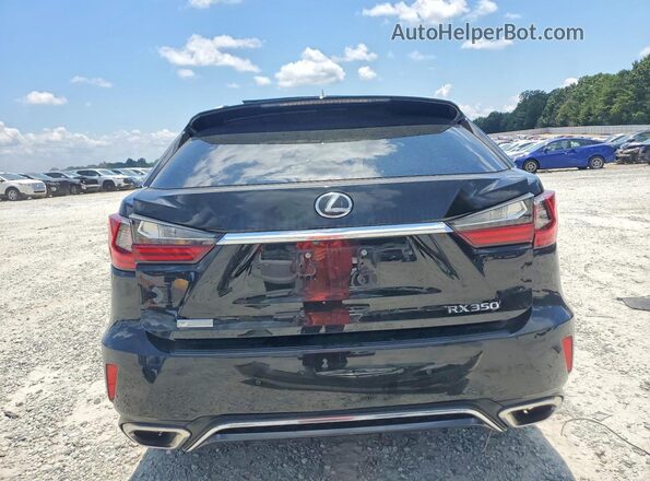 2T2BZMCAXKC174429 2019 LEXUS RX Black Vista trasera