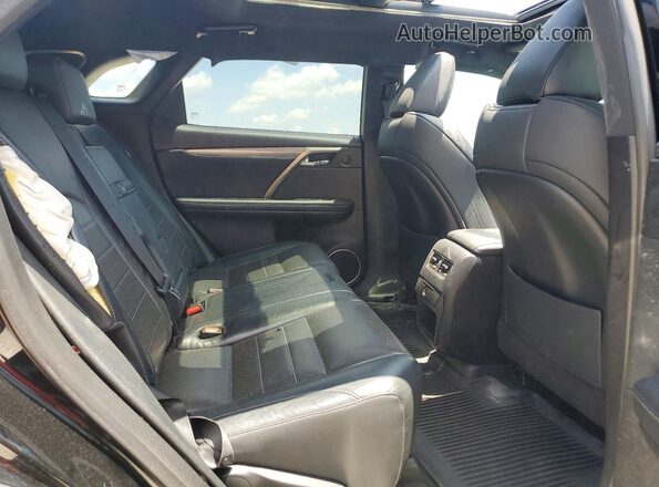 2T2BZMCAXKC174429 2019 LEXUS RX Black Vista de los asientos traseros