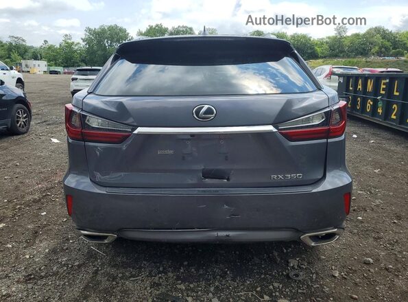2T2BZMCAXKC174527 2019 LEXUS RX Gray Rear view