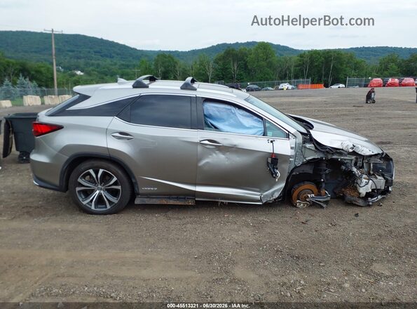 2T2HGMDAXLC047776 2020 LEXUS RX 450H Beige Rear interior view