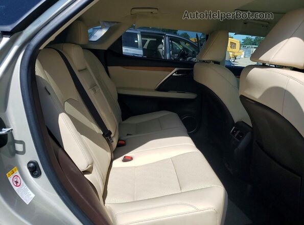 2T2HZMAA5LC152059 2020 LEXUS RX Cream Rear interior view
