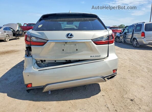 2T2HZMAA5LC152059 2020 LEXUS RX Cream Rear view