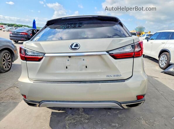 2T2HZMAA8MC218282 2021 LEXUS RX Silver Rear view