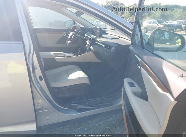 2T2HZMDA3LC256609 2020 LEXUS RX Gold Вид салону спереду