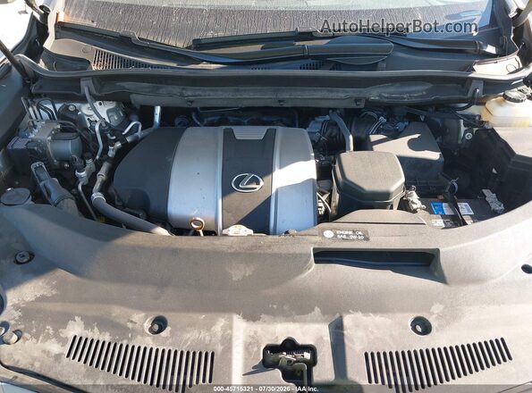 2T2HZMDA3LC256609 2020 LEXUS RX Gold Вид ззаду