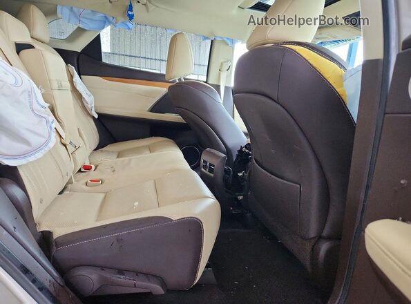 2T2ZZMCA0HC058633 2017 LEXUS RX Tan Սալոնի հետևի տեսք