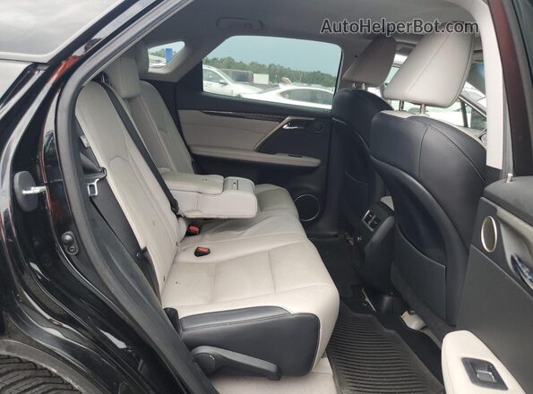 2T2ZZMCA0HC061306 2017 LEXUS RX Black Rear seats view