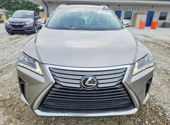 2T2ZZMCA0HC079515 2017 LEXUS RX Золотой Вид спереди