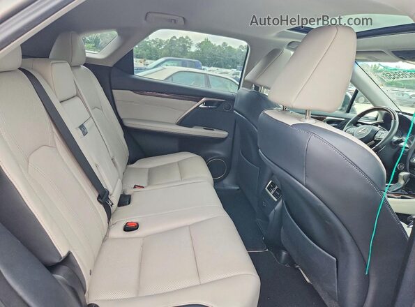 2T2ZZMCA0HC079515 2017 LEXUS RX Золотой Вид задней части салона