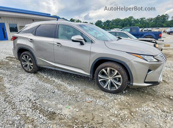 2T2ZZMCA0HC079515 2017 LEXUS RX Золотой Передняя правая четверть