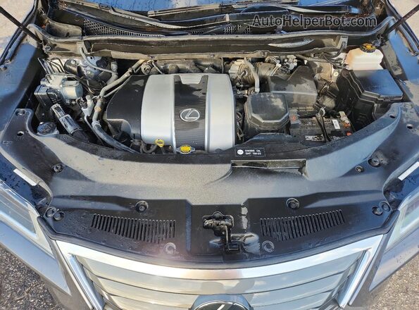 2T2ZZMCA1GC034095 2016 LEXUS RX Charcoal Rear interior view