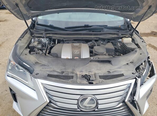 2T2ZZMCA1JC114486 2018 LEXUS RX Silver Rear interior view