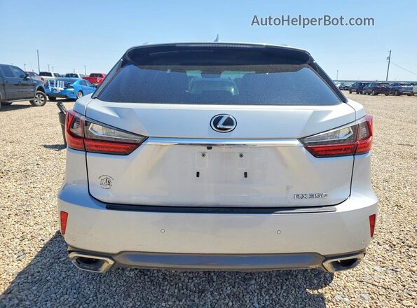 2T2ZZMCA2JC099125 2018 LEXUS RX Silver Вид ззаду