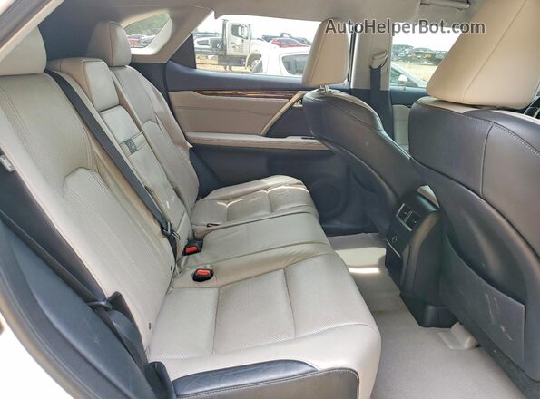 2T2ZZMCA2JC111094 2018 LEXUS RX White Rear interior view