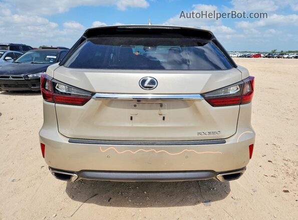 2T2ZZMCA2JC113847 2018 LEXUS RX Gold Widok z tyłu