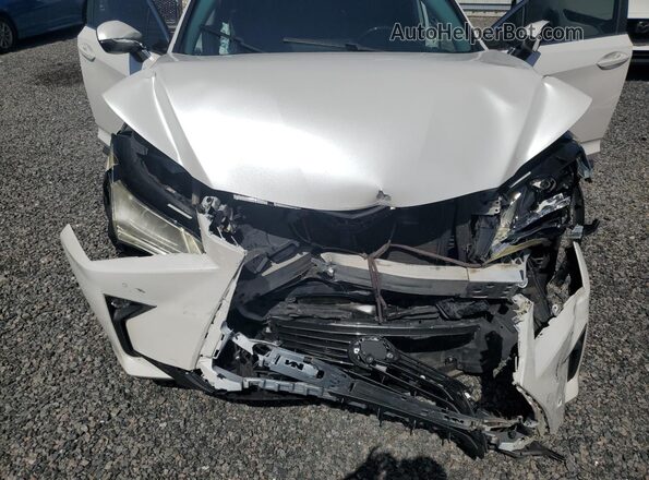2T2ZZMCA3GC013975 2016 LEXUS RX White Vista interior trasera