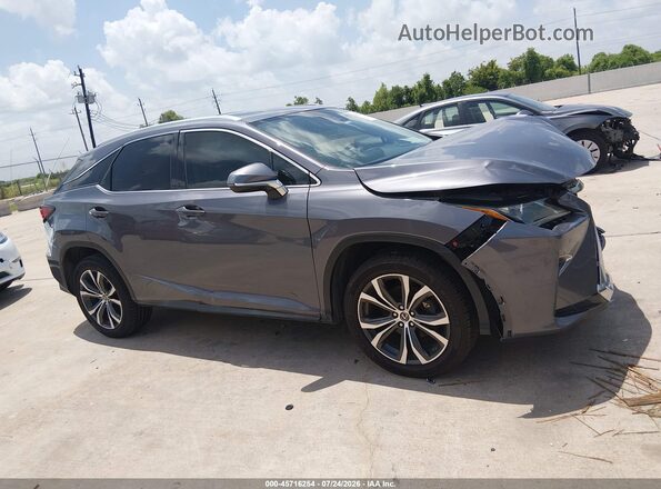 2T2ZZMCA3JC101156 2018 LEXUS RX 350 Gray Widok wnętrza z tyłu