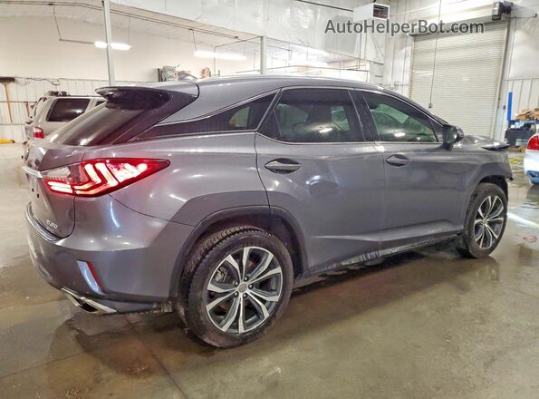 2T2ZZMCA4HC051958 2017 LEXUS RX Silver Trasero derecho