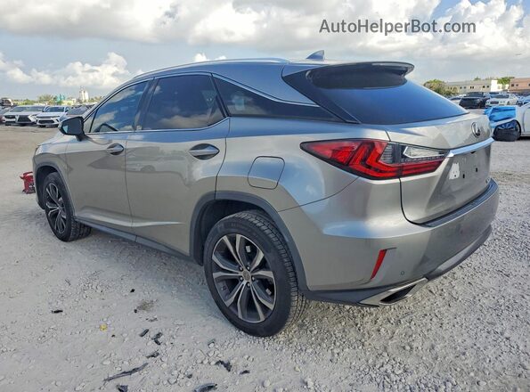 2T2ZZMCA5HC049975 2017 LEXUS RX Silver Trasero izquierdo