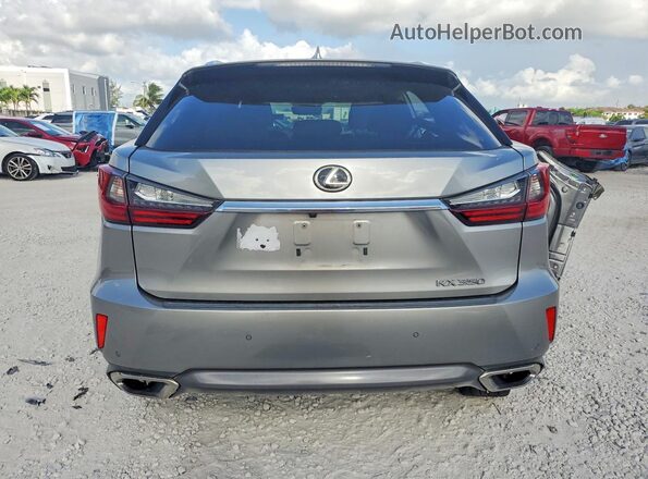 2T2ZZMCA5HC049975 2017 LEXUS RX Silver Vista trasera