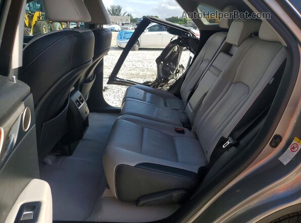 2T2ZZMCA5HC049975 2017 LEXUS RX Silver Vista interior trasera