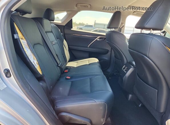 2T2ZZMCA5JC115642 2018 LEXUS RX Серебряный Вид задней части салона