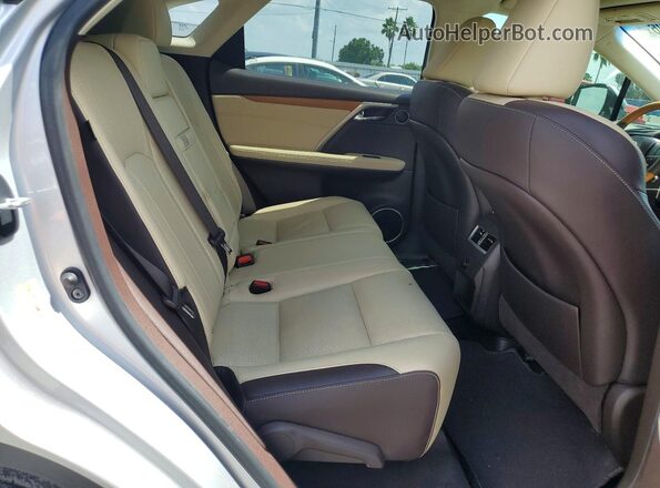 2T2ZZMCA5KC128358 2019 LEXUS RX Silver Widok wnętrza z tyłu