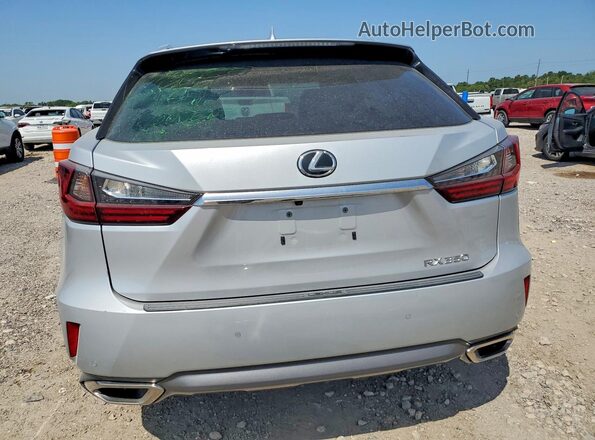 2T2ZZMCA7JC100284 2018 LEXUS RX Silver Rear view