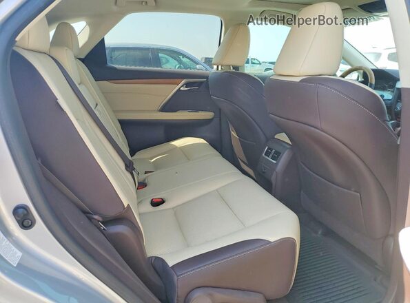2T2ZZMCA7JC100284 2018 LEXUS RX Silver Rear seats view