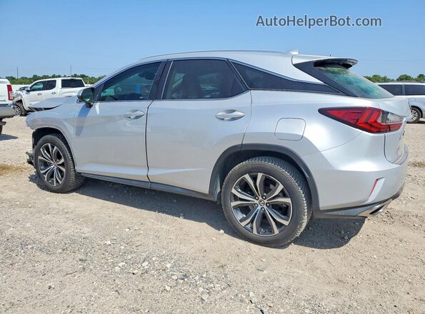2T2ZZMCA7JC100284 2018 LEXUS RX Silver Rear left