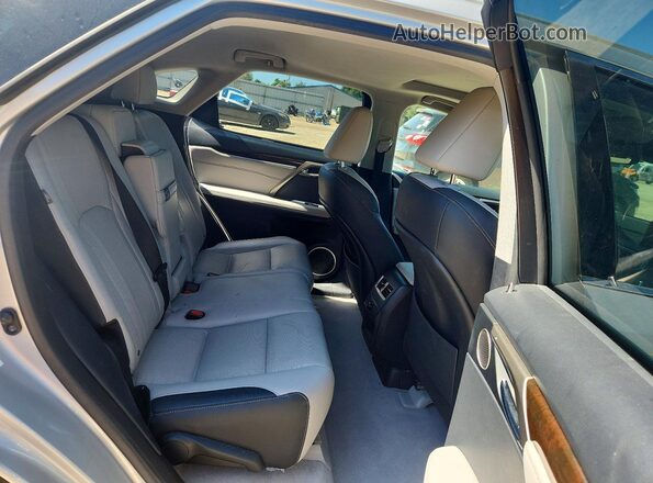 2T2ZZMCA7KC149597 2019 LEXUS RX Silver Widok wnętrza z tyłu