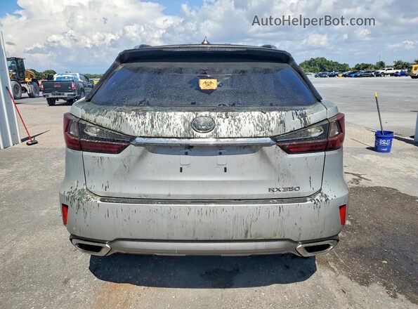 2T2ZZMCA8KC125230 2019 LEXUS RX Silver Rear view