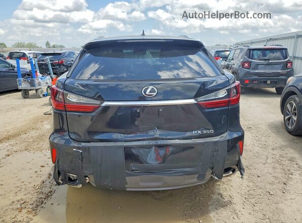 2T2ZZMCAXHC075312 2017 LEXUS RX Black Вид ззаду