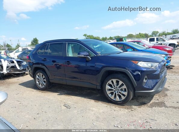 2T3A1RFV1KW033046 2019 TOYOTA RAV4 Blue Rear interior view