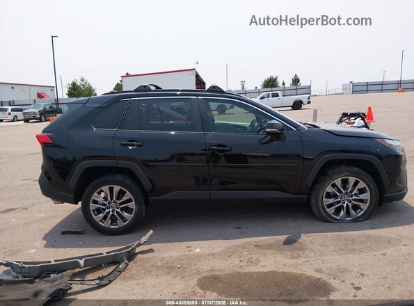 2T3A1RFV1PW355354 2023 TOYOTA RAV4 Black Вид задньої частини салону