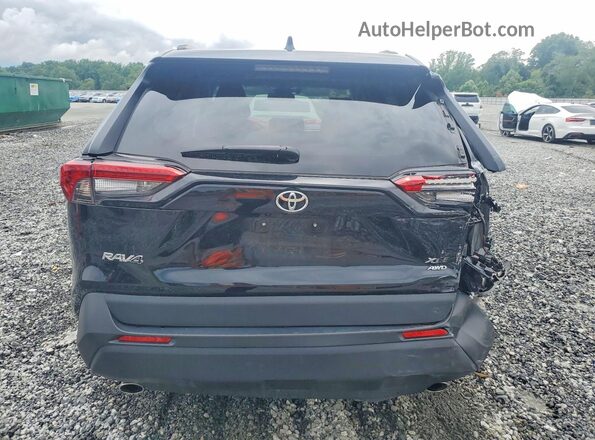 2T3A1RFV1RW429245 2024 TOYOTA RAV4 Black Widok z tyłu