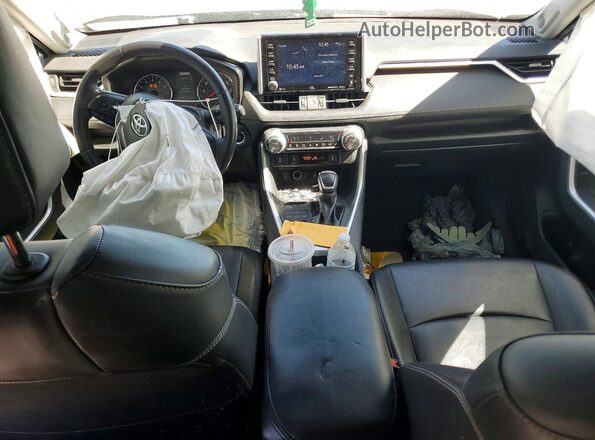 2T3A1RFVXKW071424 2019 TOYOTA RAV4 Silver Dashboard view