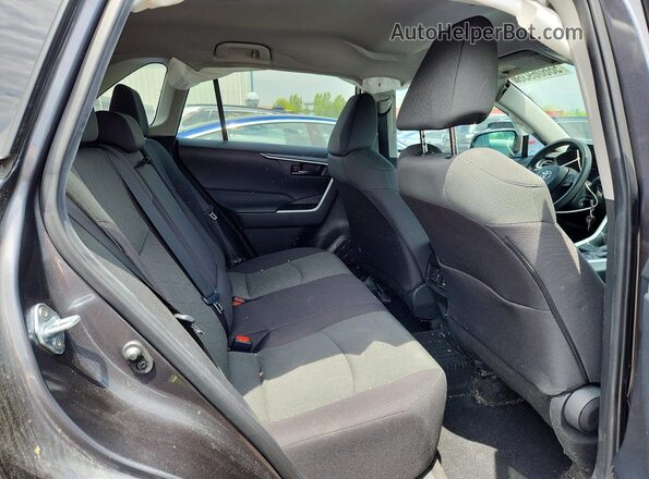 2T3B1RFV8RC421231 2024 TOYOTA RAV4 Gray Vista interior trasera