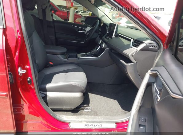 2T3B6RFV3SW084277 2025 TOYOTA RAV4 HYBRID Red Widok wnętrza z przodu