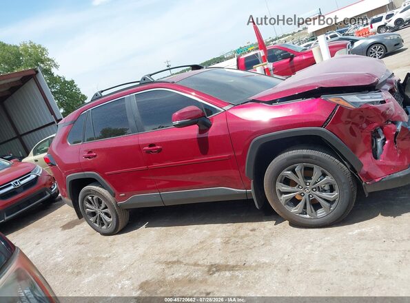 2T3B6RFV3SW084277 2025 TOYOTA RAV4 HYBRID Red Widok wnętrza z tyłu